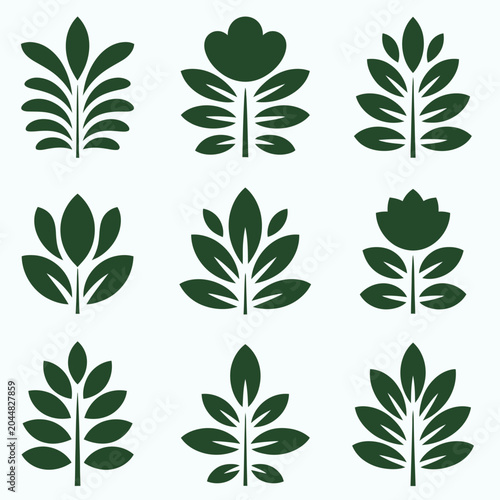 Set of green leaf and flower silhouettes on white background for design and decoration purposes  various shapes and sizes