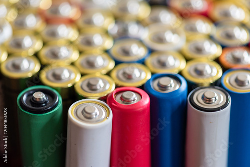 Schilderij op canvas Colorful batteries arranged closely together.