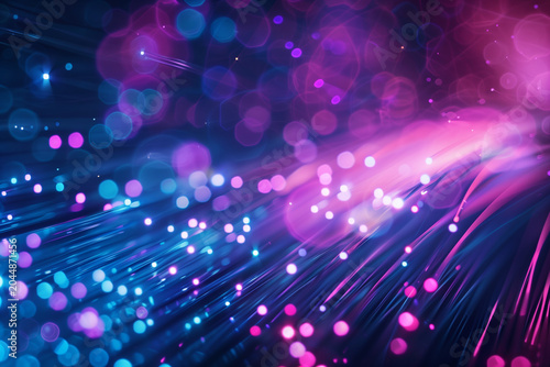 Bundle of glowing blue and purple fiber optic cables background