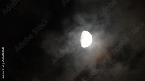 half moon and clouds at night