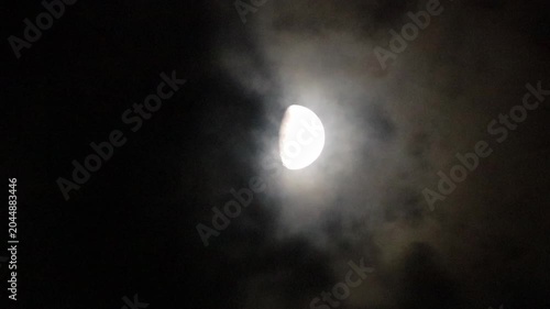 half moon and clouds at night
