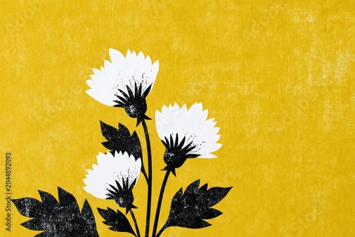 Bright yellow background with black and white flowers arranged in a simple design showcasing nature's beauty in a modern style