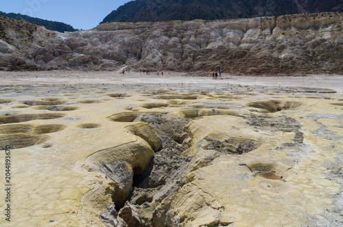 Photos Volcanic Crater Floor with Sulfur Formations and Visitors on Nisyros Greece