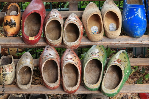 Aged Wooden Shoes on a Rack at a Urban Farm in Amsterdam, Netherlands