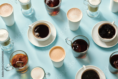 Assorted Coffee Drinks on Light Blue Background
