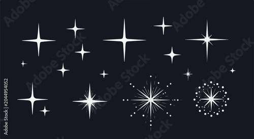 Collection of stylized white starbursts and sparkles on dark background