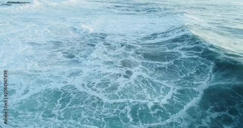 Large ocean wave forming and crashing in the open sea The Concept of environmental beauty