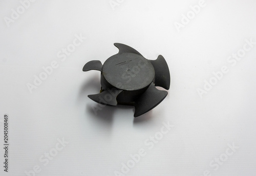 Foto impeller with rotor, part of the cooler's disassembled components, for studying