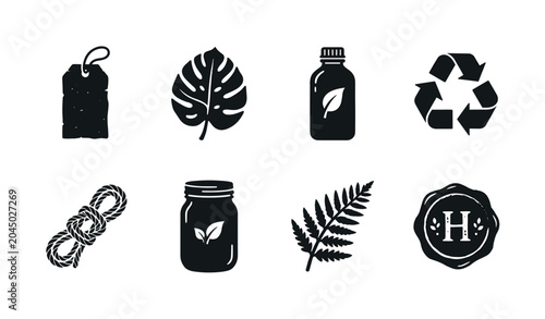 Eco Vibes Packaging Trend. Filled icon set of Eco Vibes Packaging Trend: kraft paper label, tropical leaf, eco bottle, recyclable icon, natural twine, glass jar, fern branch, handcrafted seal. Solid