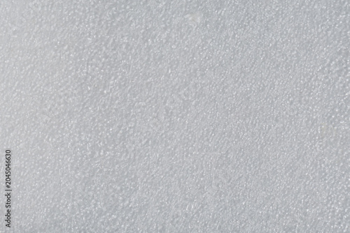 White foam packaging texture close up, soft protective material background for shipping, fragile delivery concepts, ecommerce banners and industrial packaging design