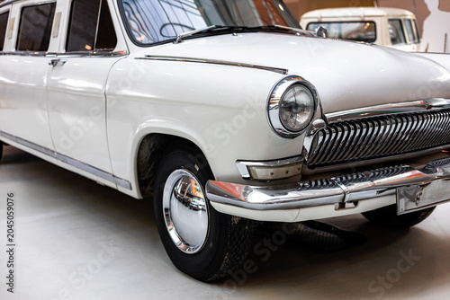 Close-up of a retro headlight. Beautiful car headlight. Car details. Premium old car