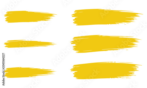 Brush Strokes Set of Yellow Paint Swashes with Rough Texture for Creative Backgrounds and Design Elements