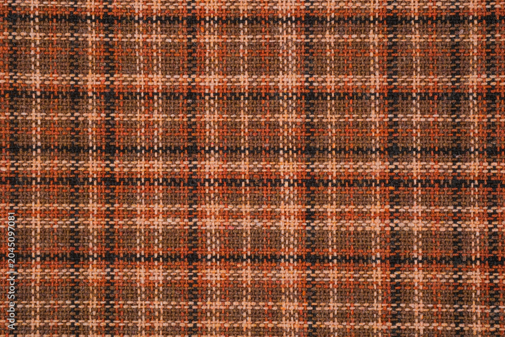Fototapeta premium Brown tweed fabric with a plaid pattern