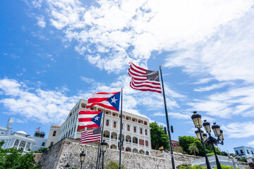 Puerto Rican and American flag flying in Old San Juan, Puerto Rico 
