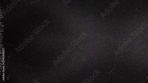 Dark black abstract carbon fiber texture background with subtle geometric pattern.