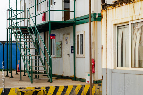 Canvas Print Modular site offices and accommodation units with external stairways located within an industrial construction camp