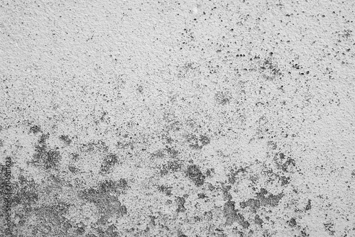 Fotografie textured white wall with dark discoloration