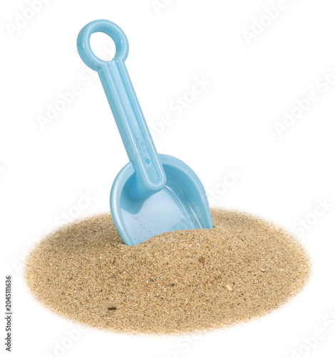 Pelle sur un fond de sable de plage