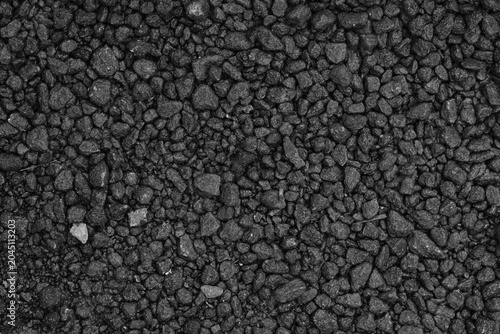 Bilde på lerret Dark asphalt surface with small grey stones