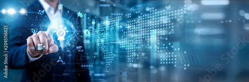 Fotografie Utility manager monitors the load, touching on circle global power