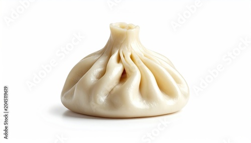 A single, plump, light-colored dumpling with a gathered top