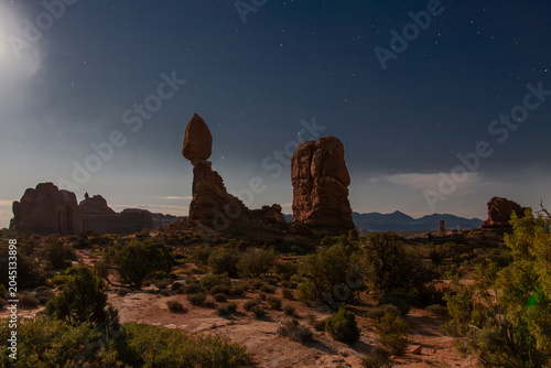 Fotografie Moonlit Balanced Rock formation at night at Arches National Park, Utah