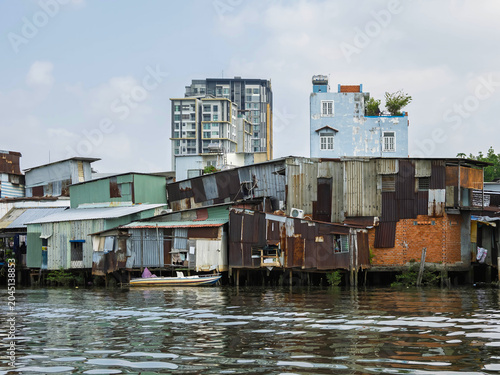 Informal Riverside Housing and High-Rise Apartments in Ho Chi Minh City, Vietnam