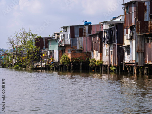 Informal Stilt Housing Along Canal in Ho Chi Minh City, Vietnam