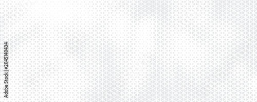 Abstract geometric halftone triangle pattern with soft beige and grey gradient wave effect for elegant background design.