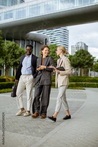 Group of friends walking an...