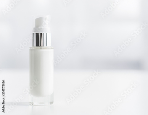 white cosmetic bottle