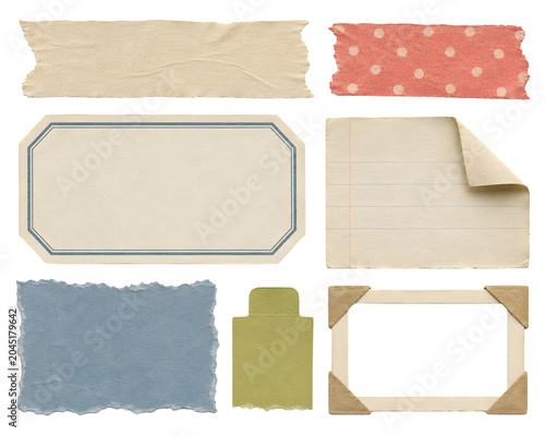 Assorted vintage paper cutouts including textured fabric, lined paper, decorative border, polka dot fabric, envelope flap, and distressed paper