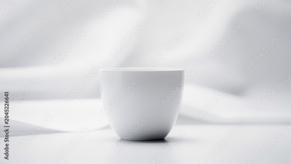 Fototapeta premium Minimalist White Ceramic Cup