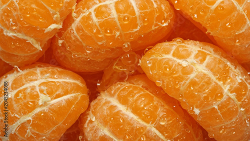 Close-up macro photo of peeled mandarin oranges