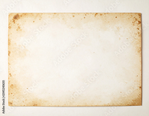 アンティークな風合いの古い紙の背景テクスチャ / Vintage old paper texture background with stains