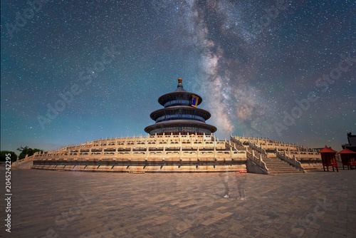 Картината върху платно At night, the Temple of Heaven in Beijing, China is under the Milky Way
