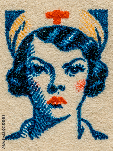 close up on lithographic print on old paper: portrait of serious nurse