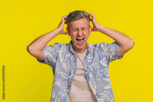 Slika na platnu Middle-aged man shouting aggressively with wide hand gestures and furious expression, expressing strong anger and heated argument