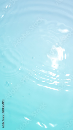 Soft Ripples on Calm Water Surface with Blue and White Colors