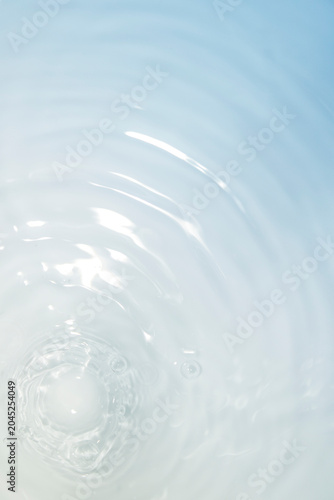 Close-up View of Water Ripples Creating Calming Patterns in Blue