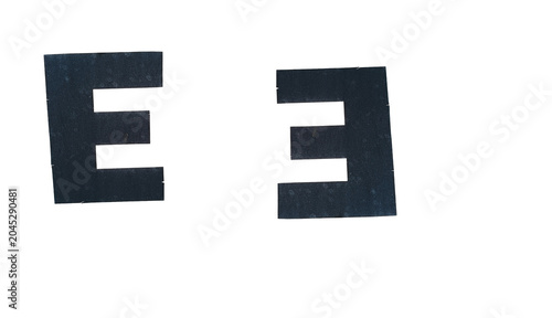 Texture letter E typography cutout on transparency. Asset for brutalism graphic design, ransom note composition, media collage, typography rendering, and UI development production workflows.