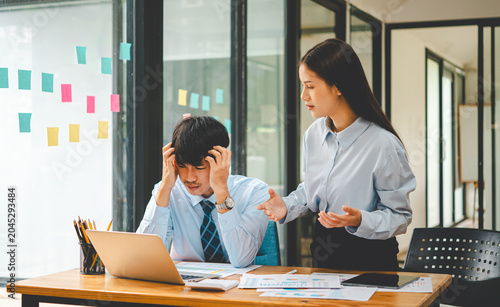 Businessmen are arguing after encountering problems in business and making mistakes at work, tense work atmosphere..