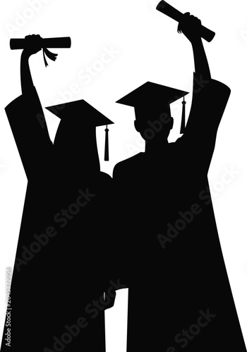 Tableau sur toile Silhouettes of two graduates in caps and gowns holding diplomas aloft in celebra