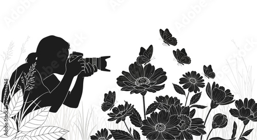 Foto A silhouette of a photographer capturing images of butterflies and flowers in a garden