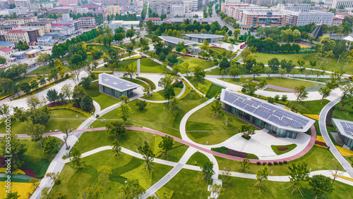 Aerial View Urban Park with Modern Buildings and Lush Greenery