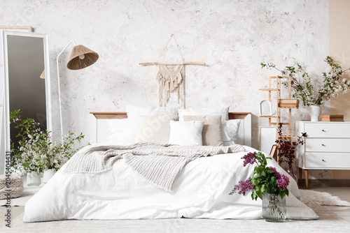 Interior of light bedroom w...