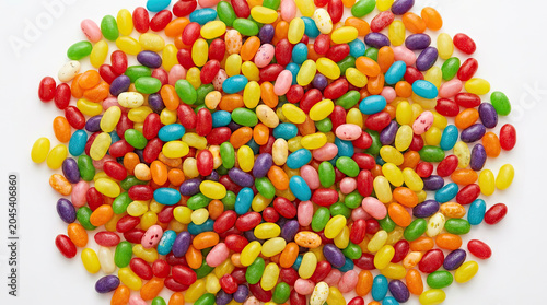 Colorful jelly bean candies in various shapes and sizes create vibrant and cheerful display