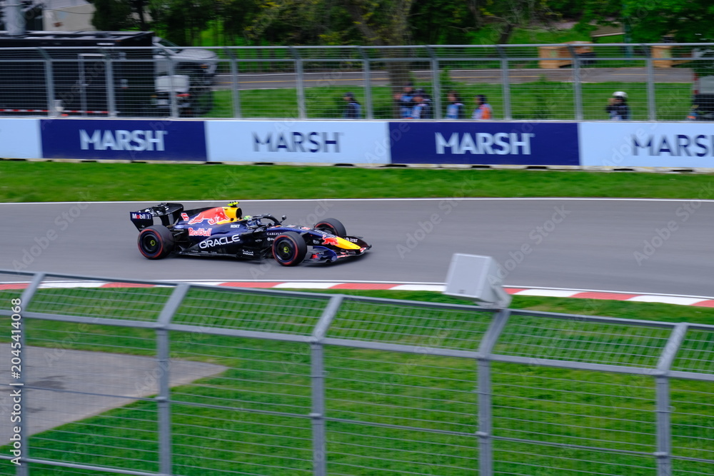 Naklejka premium May 24, 2025, Montreal, Canada: Red Bull Racing Formula 1 car during by Hadjar or Verstappen, demonstration run at Circuit Gilles Villeneuve. g.
