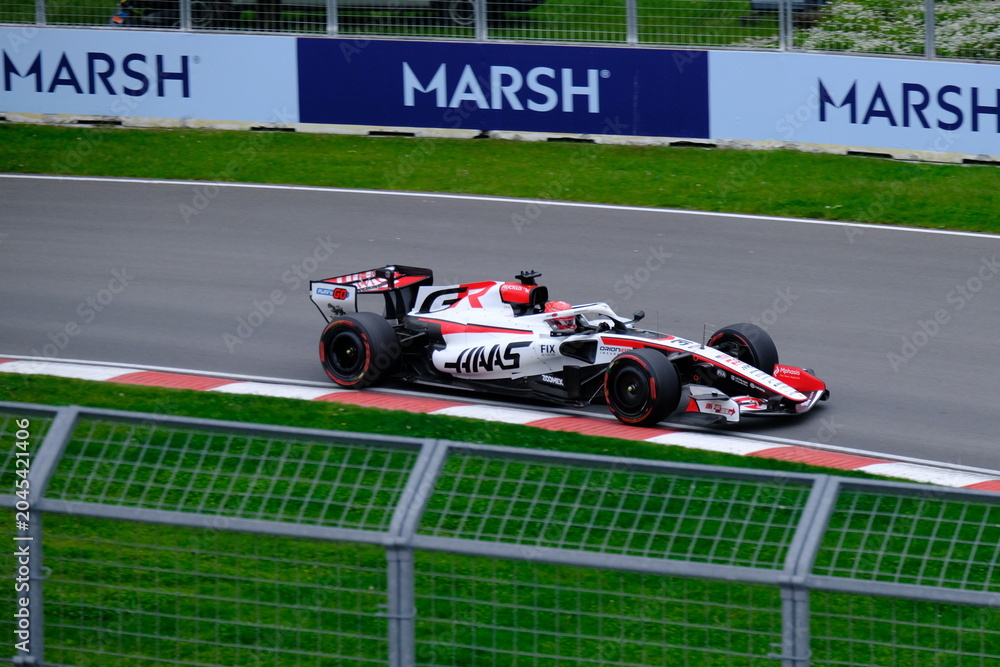 Obraz premium May 24, 2026, Montreal, Canada - Haas Formula 1 car on track by Ocon and Bearman at Circuit Gilles Villeneuve. g.