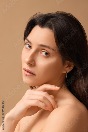 Pretty young woman with nos...
